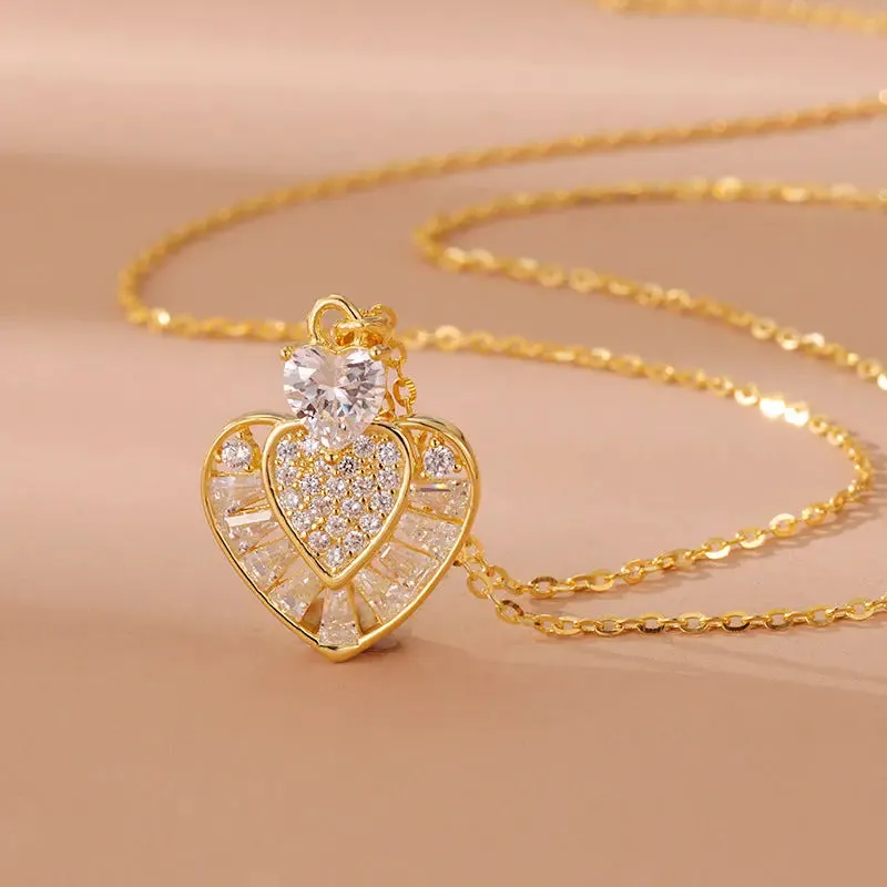 LOVCIA Gold Plated Sterling Silver Heart Pendant Necklace for Women With Pavé and Baguette-Cut Crystal Design