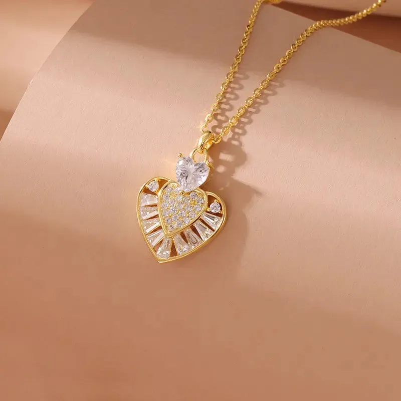 LOVCIA Gold Plated Sterling Silver Heart Pendant Necklace for Women With Pavé and Baguette-Cut Crystal Design